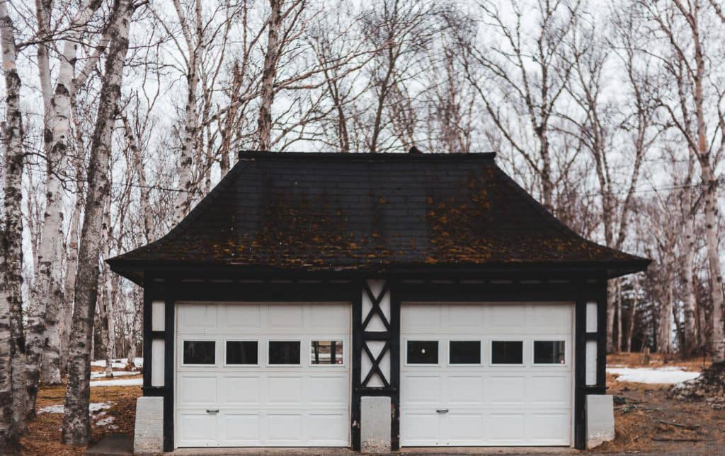 two-door garage with vaulted ceiling