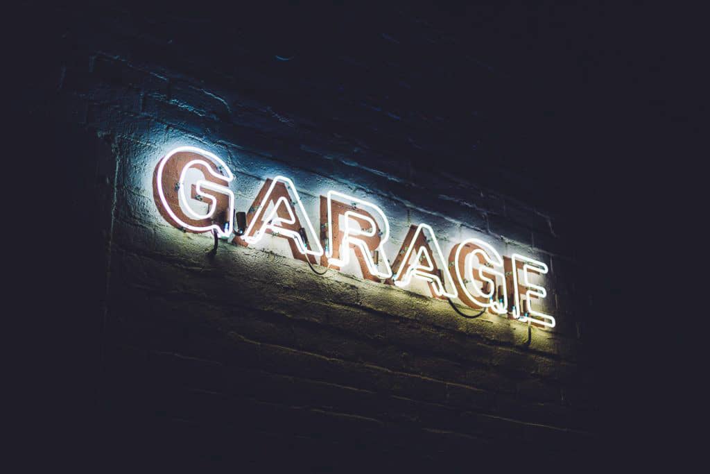 photograph of the word "garage" in neon lights